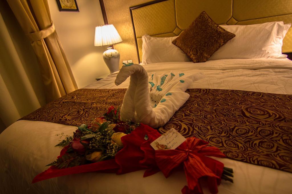 Rest Night Serviced Apartments- Alhamra Riyadh Room photo A towel swan