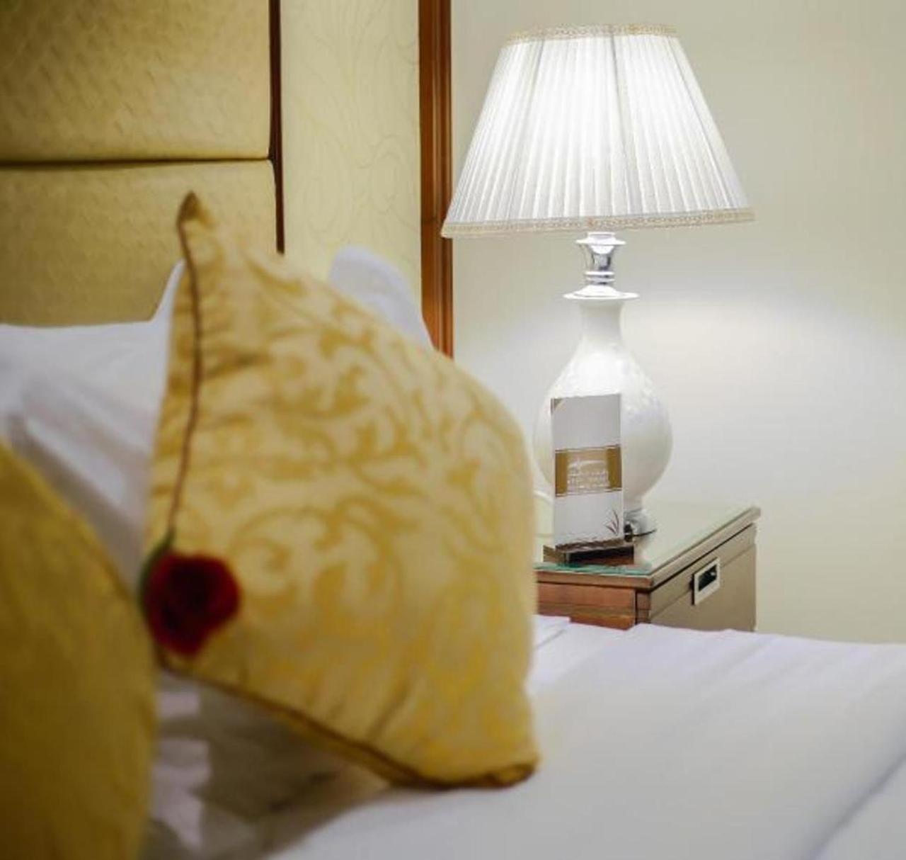 Rest Night Serviced Apartments- Alhamra Riyadh Exterior photo A lamp on a bedside table